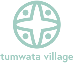 Tumwata village logo in light green.